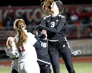 Mooney's Lucy Graziano heads the ball toward the goal during their game against Struthers at Farmers National Bank Soccer Field on Monday. EMILY MATTHEWS | THE VINDICATOR