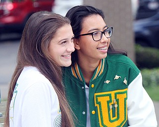 William D. Lewis The Vindicator  Ursuline tennis players Lexie Tsudis, left, and Vy Hoang during a sendoff rally at their school 10-17-18 before they head to state tennis tounrament.