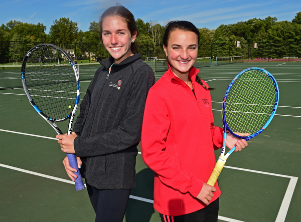 CANFIELD, OHIO - OCTOBER 16, 2018: Sydney Cianciola, left, and Cece Economus, right, pose for a portrait, Tuesday afternoon on the tennis court at Canfield High School. DAVID DERMER | THE VINDICATOR