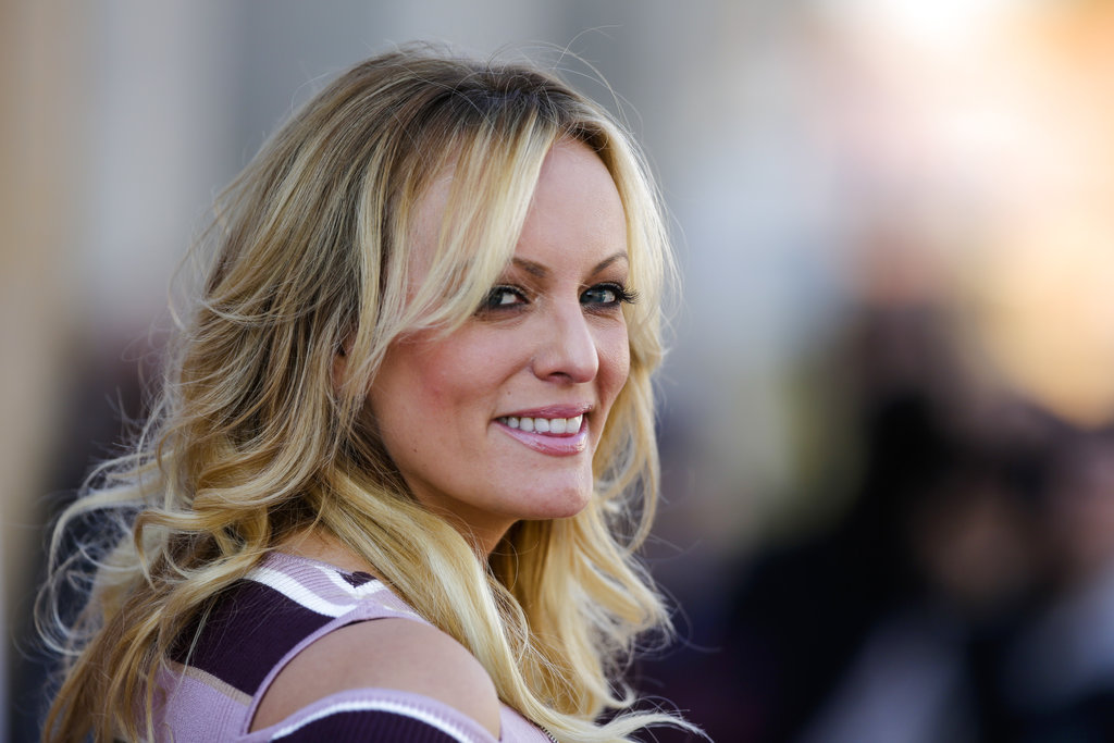 In this Oct. 11, 2018, photo, adult film actress Stormy Daniels attends the opening of the adult entertainment fair 'Venus' in Berlin, Germany. When President Donald Trump called Daniels “horseface” on Twitter, he added to his long list of creative, some say misogynistic, descriptions for women. A look at how Trump’s words, and his attitude, might play out three weeks before an election that features a record number of women candidates