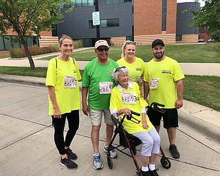 Neighbors | Submitted.The visionary behind the Joanie Abdu Comprehensive Breast Care Center, Dr. Rashid Abdu, joined Doris Stilgenbauer (front) and her family on the 2-mile Panerathon walk. Others pictured are, from left, (back) Terri Johnson, Dr. Abdu, Anna and Frank Trickett.