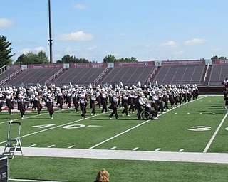 Neighbors | Jessica Harker.Members of the Boardman marching band marched on the field at Spartan Stadium to perform for students of four different elementary schools Sept. 19.
