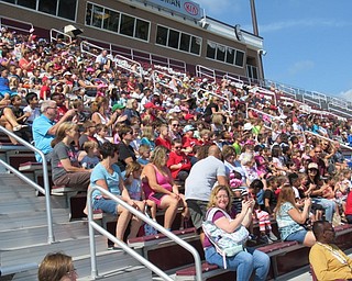 Neighbors | Jessica Harker.Elementary school students sat in Spartan Stadium Sept. 19 to watch the Boardman high school marching band perform.