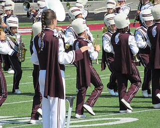 Neighbors | Jessica Harker.The student drum major directed the Boardman marching band Sept. 19 for the performance for elementary school students.