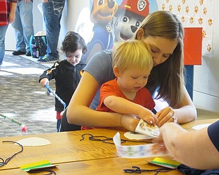 Neighbors | Jessica Harker.Children and their parents created crafts and played games during the free "Paw Patrol" party at Austintown library on Oct. 6.