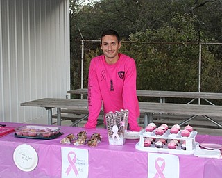 Neighbors | Abby Slanker.Canfield High School National Honor Society senior and varsity soccer player Jad Jadallah raised breast cancer awareness for his NHS service project during a Pink Out at the girls junior varsity and varsity soccer games against Austintown on Oct. 1, and the boys junior varsity and varsity soccer games against Howland on Sept. 27.