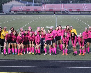 Neighbors | Abby Slanker.The Canfield High School girls varsity soccer team wore pink jerseys to raise breast cancer awareness during the Pink Out organized by NHS senior member and varsity soccer player Jad Jadallah on Oct. 1.