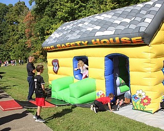 Neighbors | Abby Slanker.Hilltop Elementary School third-grade students had the chance to explore the Cardinal Joint Fire District’s inflatable Fire Safety House as a part of Fire Safety Week.