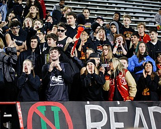 Cardinal Mooney's student section cheers during the first half of their game against Ursuline at Stambaugh Studium on Friday. EMILY MATTHEWS | THE VINDICATOR