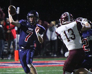 William D. Lewis The Vindicator  Fitch QB Bobby Cavalier(7) throws while Boardman's Connor Miller(13) defends during 10-191-8 action at Fitch.