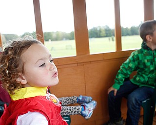 Michael Parteleno, 4, of Hubbard, rides a Thomas the Tank Engine train ride with other kids at Parto's Golf Learning Center's annual children's Halloween party on Saturday. EMILY MATTHEWS | THE VINDICATOR