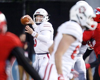 South Dakota's Austin Simmons gets ready to throw the ball during the first half of their game against Youngstown State at Stambaugh Stadium on Saturday. EMILY MATTHEWS | THE VINDICATOR