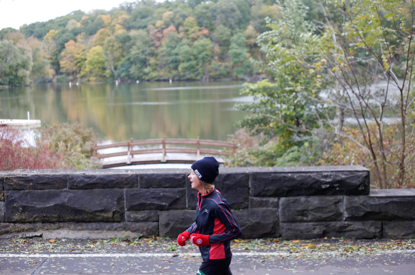 Patricia Morrison, of Canfield, runs past Lake Glacier during the Youngstown Peace Race 10K on Sunday morning. EMILY MATTHEWS | THE VINDICATOR