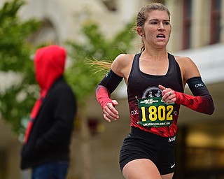 YOUNGTSOWN, OHIO - OCTOBER 21, 2018: Samantha Zishka runs down West Federal Street on her way to the finish line, Sunday morning in Youngstown. DAVID DERMER | THE VINDICATOR