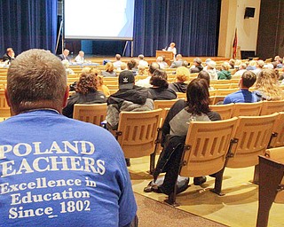 Poland teacher Rich Black was one of many teachers wearing blue Poland Education Association shirts during the Monday school board meeting. More than 300 people attended, including teachers from Boardman and Struthers who wanted to show their support for a contract between the Poland teacher’s union and the board.tract between the Poland teacher’s union and the school board.