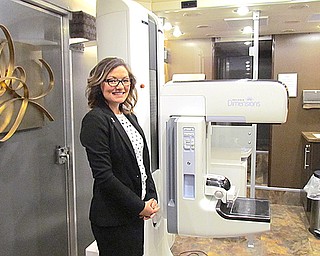 Liaison Julie Paine inside the Joanie Abdu Comprehensive Breast Care Center mobile mammography van.
