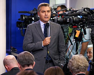 In this Aug. 2, 2018, file photo, CNN correspondent Jim Acosta does a stand up before the daily press briefing at the White House in Washington. Acosta says President Donald Trump’s attacks on the media must stop or there’s a risk someone will get hurt. He is one of the most visible members of the press corps covering Trump and a target for verbal abuse at the president’s rallies. He said Monday that Trump has, “normalized and sanitized nastiness and cruelty” in an unprecedented way.