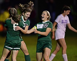 BELOIT, OHIO - OCTOBER 22, 2018: West Branch's Lexi Biery, center, is congratulated by Abie Davis, left, and Gillian Koneval after scoring a goal during the second half of their game, Monday night at West Branch High School. DAVID DERMER | THE VINDICATOR