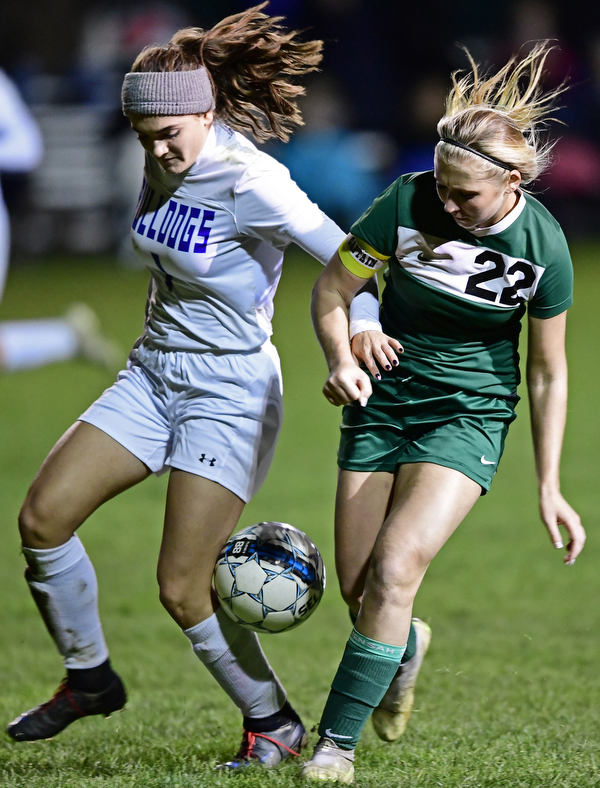 BELOIT, OHIO - OCTOBER 22, 2018: Poland's Brooke Bobbey and West Branch's Gillian Koneval battle for the ball during the second half of their game, Monday night at West Branch High School. DAVID DERMER | THE VINDICATOR