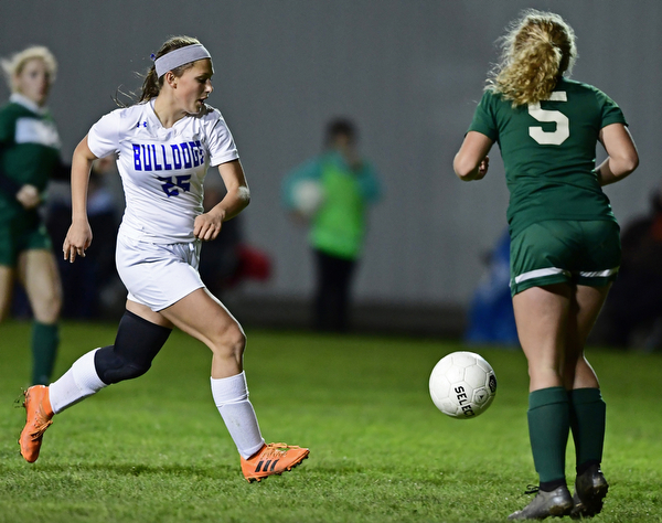 BELOIT, OHIO - OCTOBER 22, 2018: Poland's Mia Marantis moves the ball up while being pressured by West Branch's Rilery Mesler during the second half of their game, Monday night at West Branch High School. DAVID DERMER | THE VINDICATOR