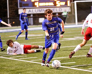 Hubbard's Jacob Gulu takes the ball down the field during their game against Canfield at Hubbard on Tuesday night. EMILY MATTHEWS | THE VINDICATOR