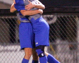 Hubbard's AJ Trobek and Anthony Gagliardi celebrate after Gagliardi scores a goal against Canfield during their game at Hubbard on Tuesday night. EMILY MATTHEWS | THE VINDICATOR