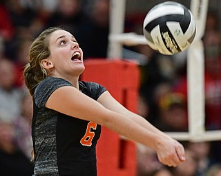 SALEM, OHIO - OCTOBER 24, 2018: Springfield's Rachel Babinec bumps the ball during their OHSAA Division III Tournament volleyball match, Wednesday night at Salem High School. DAVID DERMER | THE VINDICATOR