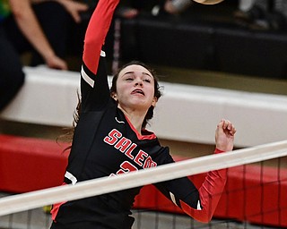 SALEM, OHIO - OCTOBER 24, 2018: Salem's Elly Exline hits the ball during their OHSAA Division III Tournament volleyball match, Wednesday night at Salem High School. DAVID DERMER | THE VINDICATOR