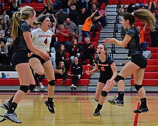 SALEM, OHIO - OCTOBER 24, 2018: Springfield's Rachel Babinec (6) Makenzy Capouellez (4) Kaelen Yemma, right, and Carly Stitzel, left, celebrate after scoring the final point and defeating Crestview 3-2 during their OHSAA Division III Tournament volleyball match, Wednesday night at Salem High School. DAVID DERMER | THE VINDICATOR