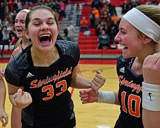 SALEM, OHIO - OCTOBER 24, 2018: Springfield's Ellie Centofanti (10) Lyndsey Smith, left, Rachel Babinec (6) and Jennie Stitzel (5) celebrate after defeating Crestview 3-2 during their OHSAA Division III Tournament volleyball match, Wednesday night at Salem High School. DAVID DERMER | THE VINDICATOR