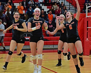 SALEM, OHIO - OCTOBER 24, 2018: Springfield's Ellie Centofanti (10) Lyndsey Smith, left, Rachel Babinec (6) and Jennie Stitzel (5) celebrate after defeating Crestview 3-2 during their OHSAA Division III Tournament volleyball match, Wednesday night at Salem High School. DAVID DERMER | THE VINDICATOR