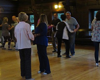 Neighbors | Jessica Harker.Community members attending the Swing Dancing class practiced basic steps with dance parteners Sept. 25 at Pioneer Pavillion.