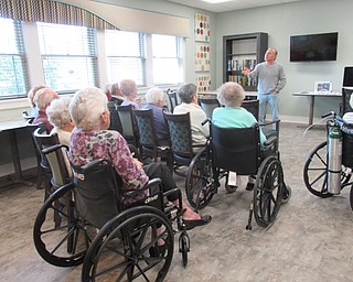 Neighbors | Jessica Harker.Seniors at the Inn at Poland Way Retirement home listened to a lecture by Ray Mancini Oct. 16.