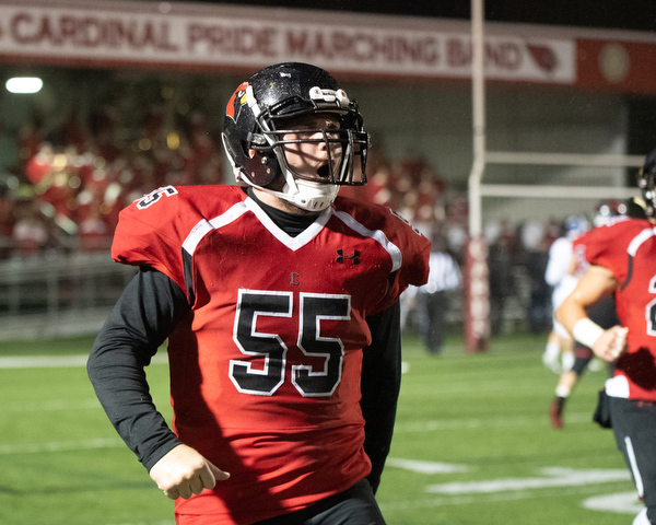 DIANNA OATRIDGE | THE VINDICATOR  Canfield's Vince Giordano (55) celebrates a Cardinal touchdown during their 34-7 victory against Poland in the Battle of 224 at Bob Dove Field in Canfield on Friday.