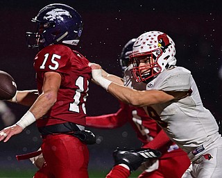 AUSTINTOWN, OHIO - OCTOBER 26, 2018: Fitch's Domenic Montalbano scores a touchdown before being thrown down by Mooney's Jason Santisi, who would be called for a penalty, during the first half of their game, Friday night at Austintown Fitch High School. DAVID DERMER | THE VINDICATOR