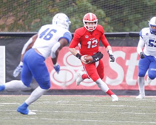 YSU's Montgomery VanGorder runs with the ball during their game against Indiana State at Stambaugh Stadium on Saturday. EMILY MATTHEWS | THE VINDICATOR