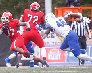 YSU's Tevin McCaster runs with the ball during their game against Indiana State at Stambaugh Stadium on Saturday. EMILY MATTHEWS | THE VINDICATOR