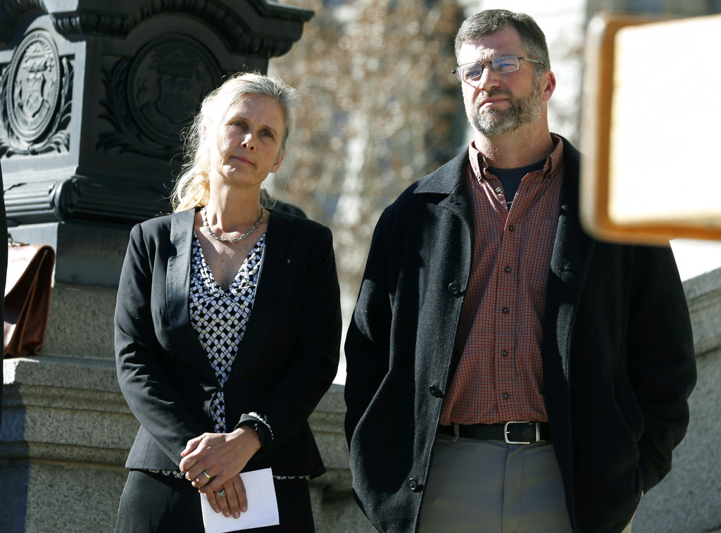 In this Feb. 19, 2015, file photo, Hope, left, and Mike Reilly of Pueblo, Colo., attend a news conference in reaction to the announcement that a federal lawsuit is being filed on behalf of the couple by a Washington D.C.-based group to shut down the state's $800-million-a-year marijuana industry, in Denver. A federal trial in Colorado on Monday, Oct. 29, 2018, could have far-reaching effects on the budding U.S. marijuana industry if a jury sides with the couple who say having a cannabis business as a neighbor hurts their property's value.