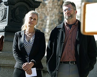 In this Feb. 19, 2015, file photo, Hope, left, and Mike Reilly of Pueblo, Colo., attend a news conference in reaction to the announcement that a federal lawsuit is being filed on behalf of the couple by a Washington D.C.-based group to shut down the state's $800-million-a-year marijuana industry, in Denver. A federal trial in Colorado on Monday, Oct. 29, 2018, could have far-reaching effects on the budding U.S. marijuana industry if a jury sides with the couple who say having a cannabis business as a neighbor hurts their property's value.