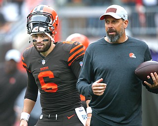 Cleveland Browns quarterback Baker Mayfield, left, is shown with Todd Haley, offensive coordinator at a game earlier this season. On Monday, the Browns fired Haley and head coach Hue Jackson. Gregg Williams, defensive coordinator, will serve as interim head coach.