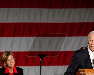 Former Vice President of the United States Joe Biden speaks in support of Ohio gubernatorial candidate Richard Cordray while running mate Betty Sutton listens Monday afternoon at Youngstown State University. EMILY MATTHEWS | THE VINDICATOR