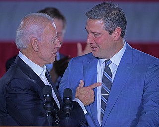 YOUNGSTOWN, OHIO - OCTOBER 29, 2018: Former Vice President of the United States Joe Biden, left, embraces United States Congressmen Tim Ryan at the podium in support of Ohio gubernatorial candidate Richard Cordray, Monday afternoon at Youngstown State University. DAVID DERMER | THE VINDICATOR