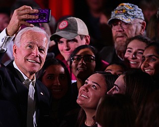 YOUNGSTOWN, OHIO - OCTOBER 29, 2018: Former Vice President of the United States Joe Biden takes a selfie with supporters at a rally in support of Ohio gubernatorial candidate Richard Cordray, Monday afternoon at Youngstown State University. DAVID DERMER | THE VINDICATOR