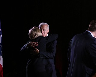 Former Vice President of the United States Joe Biden hugs Betty Sutton, running mate of Ohio gubernatorial candidate Richard Cordray, Monday afternoon at Youngstown State University. BOB YOSAY | THE VINDICATOR
