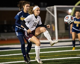 DIANNA OATRIDGE | THE VINDICATOR  South Range's Bree Kohler (13) looks to gain possession of the ball in front of Kirtland's Reilly Greenlee during their Division III regional semifinal in Solon on Tuesday.