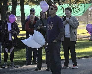 Neighbors | Jessica Harker .Robert Bowman, Lauren Bowman's father, gave a speech before the third annual memorial walk on Oct. 14 at Austintown Park.