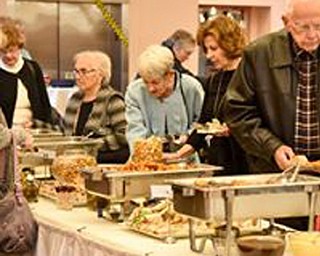 Neighbors | Submitted.Attendees at the Library Societies Annual Fundraiser featuring Lisa Gardner ate dinner at the Main library Oct. 18.