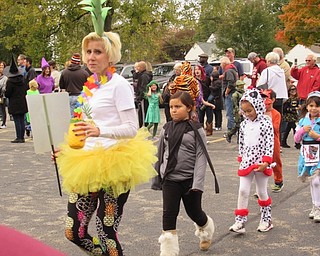 Neighbors | Jessica Harker.Students and teachers at Boardman's Stadium Drive Elementary School walked through the parking lot to show off their costumes in the annual Halloween parade on Oct. 26.