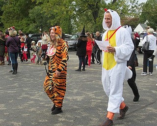 Neighbors | Jessica Harker.A group of teachers from Stadium Drive Elementary School dressed as beanie babies for the schools annual Halloween parade.