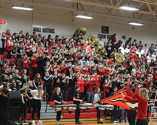 Neighbors | Abby Slanker.The Canfield High School Cardinal marching band and color guard performed several songs at the school’s Spirit Week pep rally.